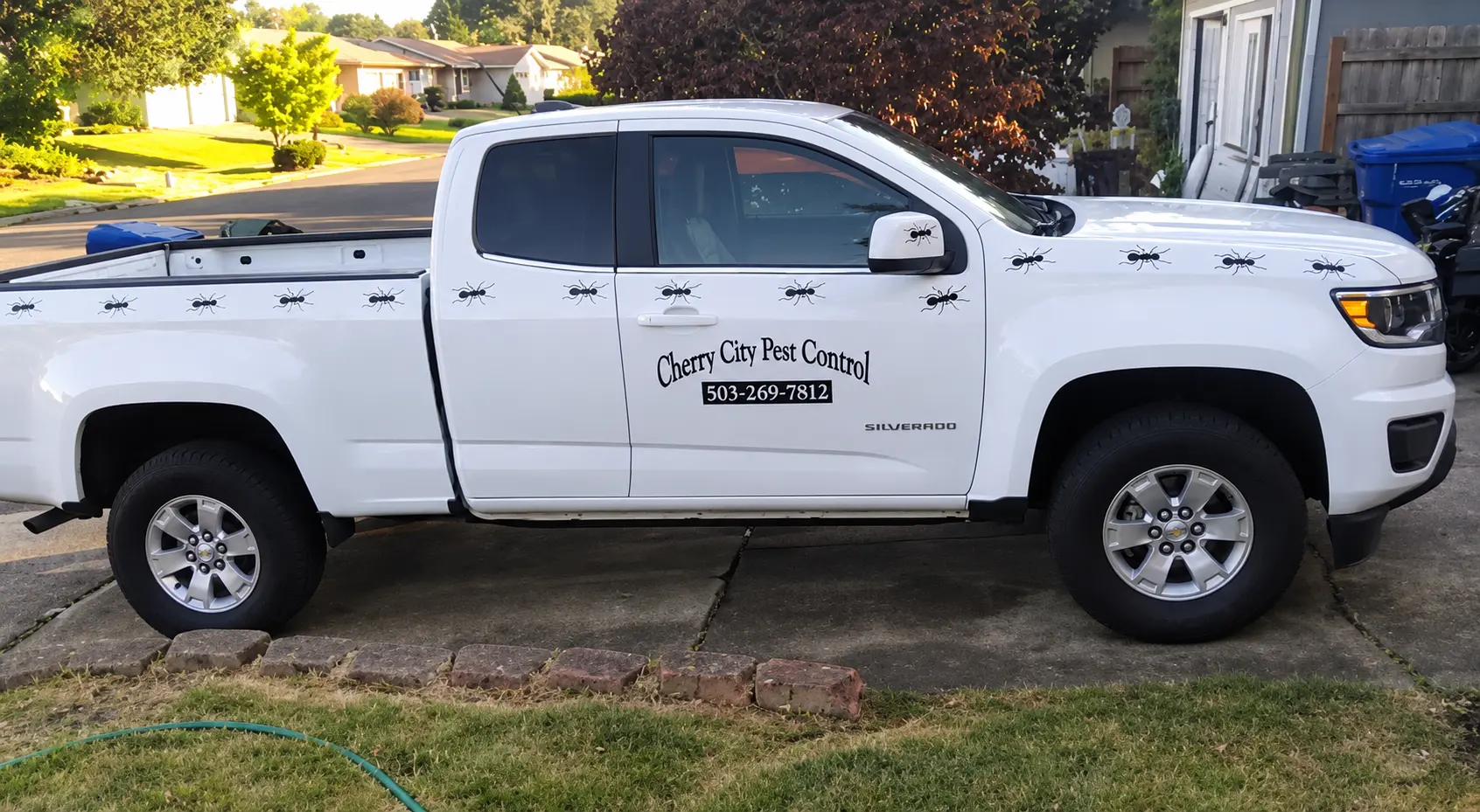 A Cherry City Pest Control service truck parked in a Salem-area driveway